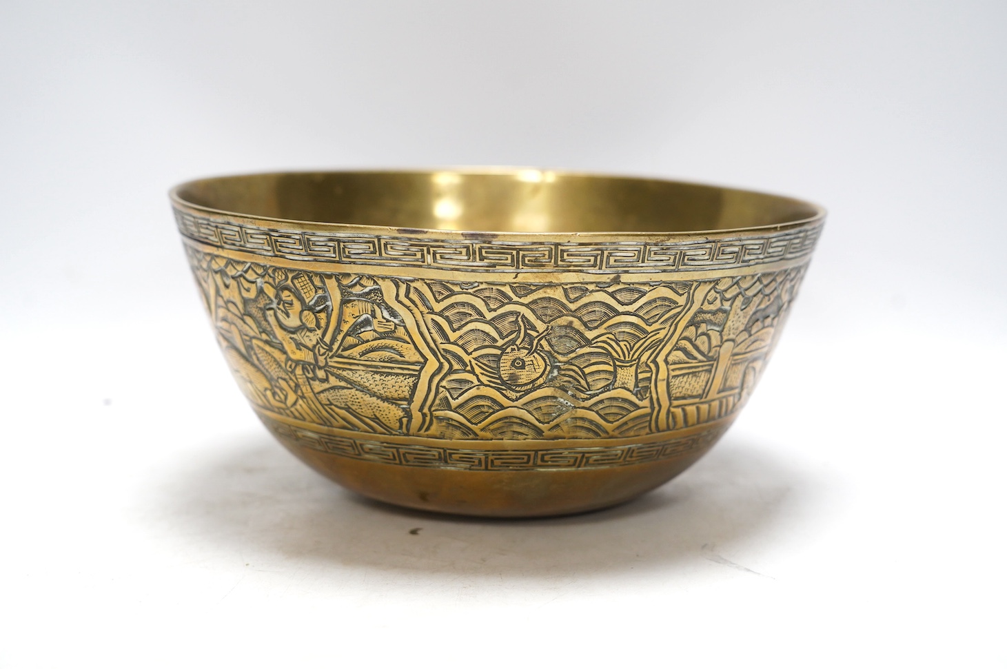A Chinese bronze censer and cover, a Chinese bronze bowl and an Indian bronze seated deity, tallest 19cm high. Condition - fair some general scuffs and wear, the figure has a chip